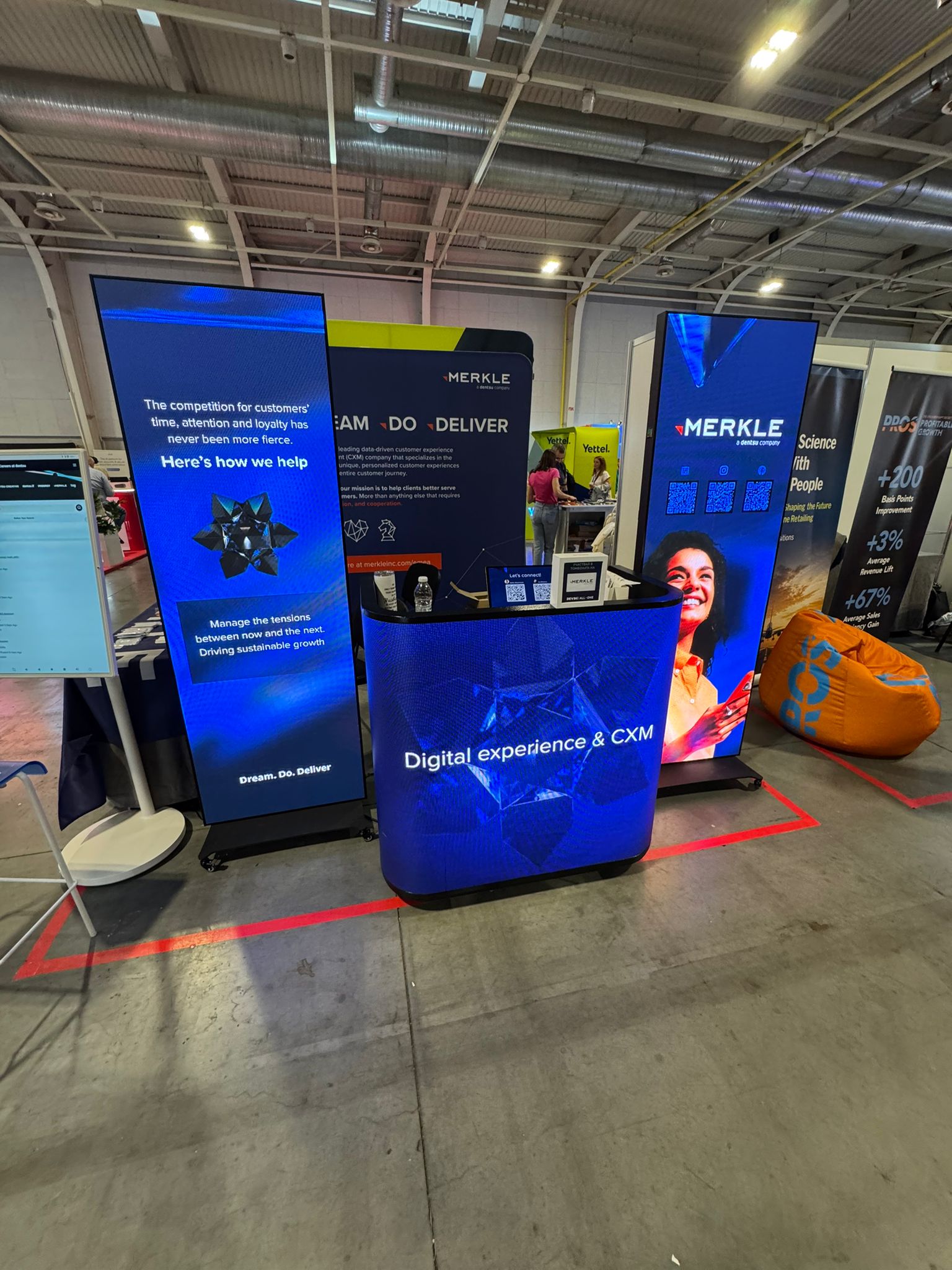 LED poster displays at trade show booth